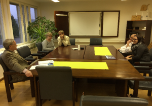 William with some faculty members at Iso Kirja